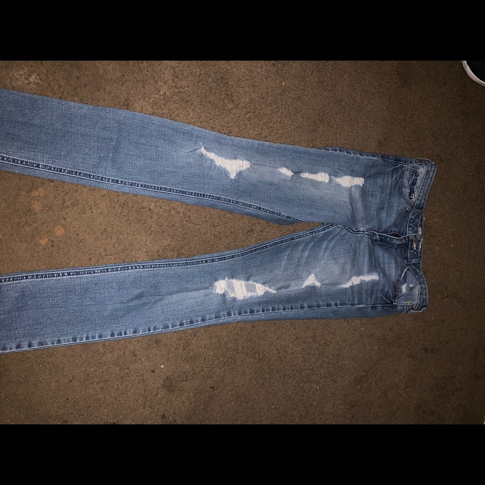 Light blue ripped jeans